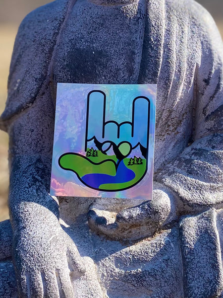 Buddha Approved Après Hike Logo holographic sticker close up