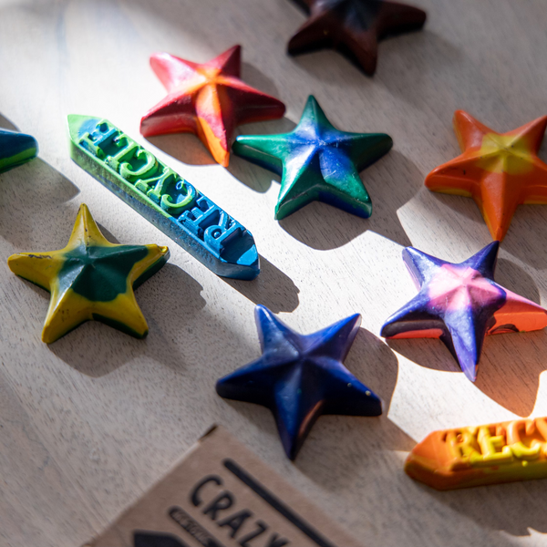 Eco friendly 100% Recycled swirl stars and stick shaped crayons in the morning light.